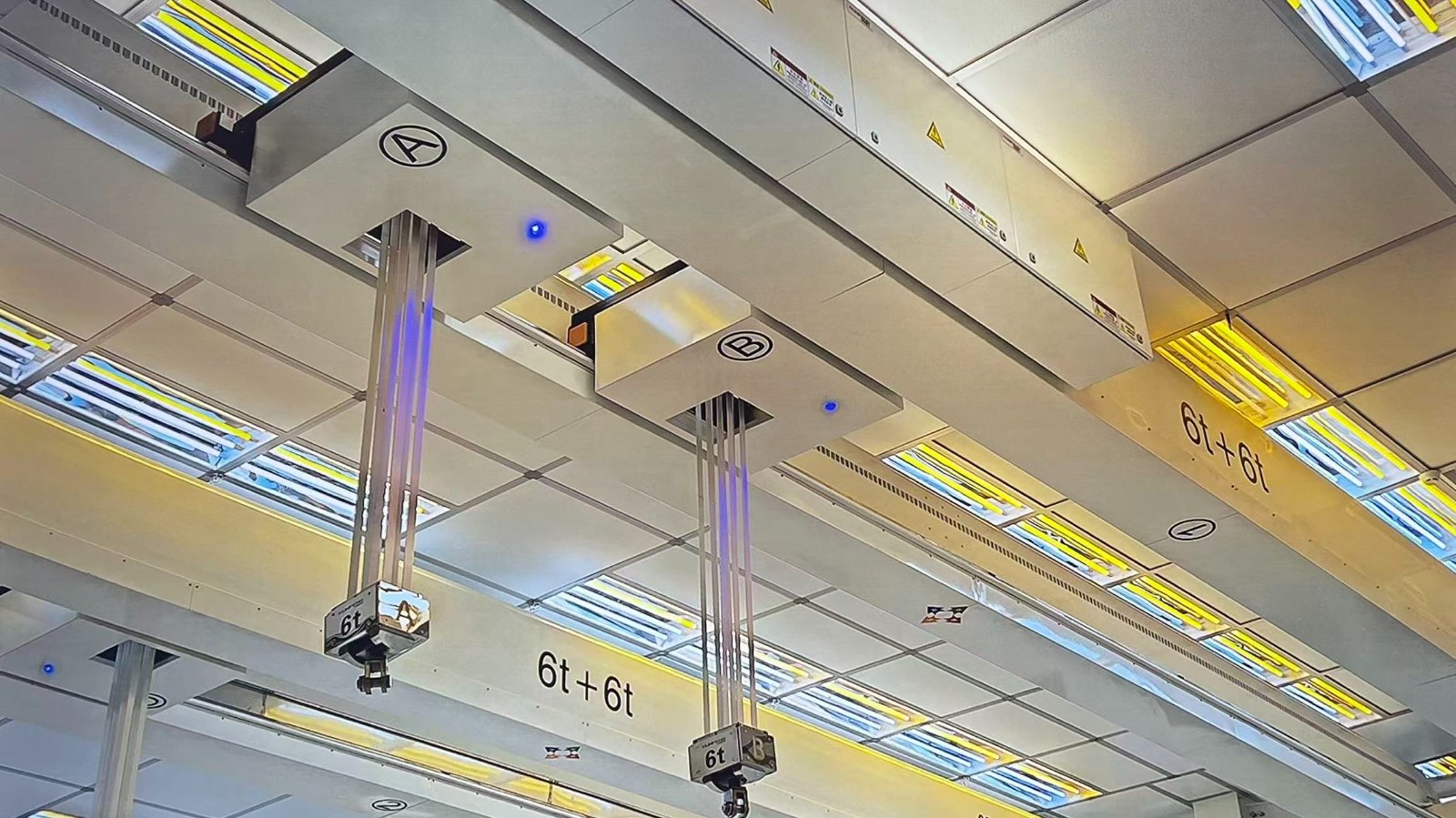 Belt hoists for cleanroom lifting