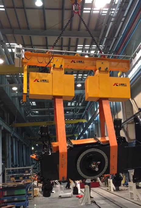 Load rotator for turning chassis